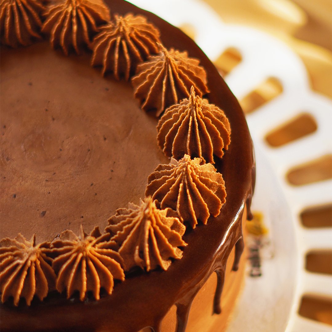 Chocolate Malt Cake with creamy topping by CakeBites
