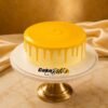 Three Milk Mango Cake 2.5 lbs medium size by Cakebites.pk with glossy mango glaze and cream ridges
